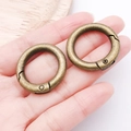 Pair of antique bronze spring O-rings with vintage brushed metal texture for handbags - 28mm / Antique Bronze