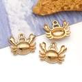 Three gold crab-shaped stainless steel pendants with ring loops for DIY jewelry making - Small Crab (T3033)