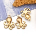 Detailed macro view of three golden octopus charms for DIY jewelry making and crafting - Small Octopus (T3034)