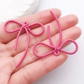 Ciondolo a fiocco rosa in lega con finitura testurizzata per accessori per gioielli fai da te - Rosso rosa