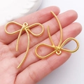 Ciondolo a fiocco dorato traforato con trama a spirale per creazione gioielli DIY - Oro