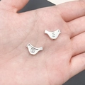 Detailed view of two small bird-shaped antique silver alloy beads for DIY jewelry making - Bird Spacer Bead (2848)