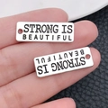 Antique silver pendant engraved with Strong Is Beautiful for DIY jewelry making - Letter Plate STRONG (9006)