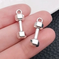 Pair of shiny silver dumbbell charms for DIY fitness jewelry necklaces and keychains - Barbell Lifting Style (9008)