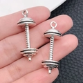Pair of antique silver dumbbell pendants for DIY jewelry making and fitness charms - Barbell Dumbbell Style (9011)