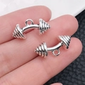 Pair of vintage silver dumbbell pendants for DIY jewelry making and fitness charms - Curved Dumbbell Style (9015)