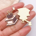 Detailed view of coffee grinder pendants in gold alloy with brown enamel finish - 1pc Coffee Drip Oil Hand Crank Coffee Grinder (27171)