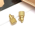 Detailed view of gold plated lipstick charms for DIY jewelry making with polished finish - Lipstick Style (T2847)