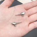 Pair of antique silver bird charms in palm for DIY jewelry making and handmade crafts - Bird (4976)