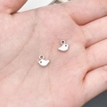 Silver bird shaped alloy pendants for DIY jewelry making shown in hand for scale - Bird (8315)