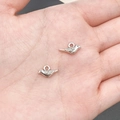 Pair of antique silver bird charms in palm for DIY necklace and jewelry making - Bird (9190)
