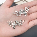 Antique silver alloy bird connectors for DIY jewelry making featuring twin swallow designs - Bird Magpie Branch Dual Hole Connector (B305)