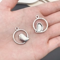 Silver bird charm pendant in round frame for DIY jewelry making and necklaces - Ring Circle Bird (B36)