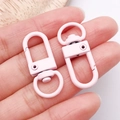 Pair of light pink matte swivel lobster clasps for DIY jewelry and keychain accessories - Oval Snap Hook (26354)