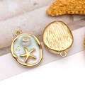Detail of gold crab pendant with blue enamel, white pearl and golden starfish - Enamel Green Starfish Pearl Style (T2526)