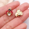 Pendentif coccinelle en émail rouge avec points noirs et strass brillant sur métal doré - Coccinelle en Émail Rouge Avec Strass