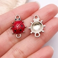 Charm coccinelle rouge avec finition émail pour la création de bijoux et bracelets - Coccinelle Émail Rouge Argenté Deux Boucles