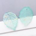Frosted light mint green leaf pendant with gold foil and 24x17mm pre-drilled hole - Frosted Green With Gold Foil (26897)