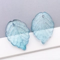 Light blue glitter glass strawberry leaf pendants with vein details and top holes - Transparent Blue With Fine Glitter (26899)
