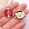 Pendentif coccinelle en émail rouge et métal doré pour la création de bijoux DIY - Scarabée Rond Émail Rouge