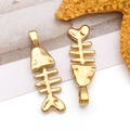 Detailed view of a golden fishbone charm pendant for DIY handmade jewelry and necklaces - Fish Bone Style (T2529)
