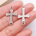 Silver vintage cross pendant with white rhinestones showing front and back view - Silver Rhinestone Cross (27082)