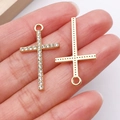 Golden alloy cross pendant with pavé white rhinestones and hollow metal back - Gold Rhinestone Cross (27079)