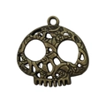 Antique bronze hollow skull pendant with intricate floral engravings and a top loop - Skull