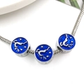 Silver snake chain bracelet with three dark blue enamel charms featuring celestial patterns - Reindeer Large Hole Bead (14100)