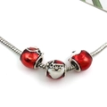 Silver snake chain bracelet featuring a Santa Claus enamel bead and festive red charms - Santa Claus Large Hole Bead (14102)