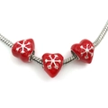 Silver snake chain bracelet with three red enamel heart charms featuring snowflake patterns - Heart Large Hole Bead (14104)