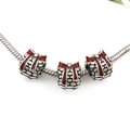 Silver snake chain bracelet featuring three charms with red enamel bows and pebbled texture - Christmas Series Large Hole Bead (14109)