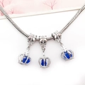 Silver snake chain bracelet with three dark blue crown pendants and bow charms - Blue Crown Pendant (15205)