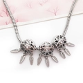 Detail view of silver dreamcatcher necklace charm with leaf pendants and inset crystals - Dreamcatcher Hole Pendant (15209)