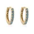 Detail of small gold huggie earrings featuring inlaid turquoise gemstones and secure hinge - Gold Tone Turquoise Style
