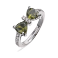 Detailed view of silver bow ring with olive green triangular zircons and fine white diamonds - Silver Olive Green Zirconia