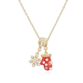 Détail du collier de Noël doré avec flocon de cristal et breloque gant rouge - Collier Flocon de Neige Moufle de Noël Doré