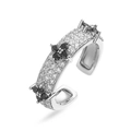 Macro view of adjustable silver ring with sparkling white diamonds and black floral patterns - Silver Black Zirconia Clover Ring