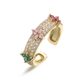 Close-up of golden adjustable clover ring with pink and green pavé set gemstones - Gold Multi-color Zirconia Clover Ring