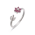 Detailed macro shot of silver floral open ring with pink crystals and leaf accents - Platinum Tone Rose Red Zircon Flower Ring