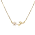 Detailed macro view of gold camellia flower pendant necklace with shimmering crystals - Gold White Zirconia Flower Necklace