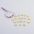 Close-up of golden alphabet beads with leopard print ribbon for DIY jewelry making - Letter A / Pink Leopard Rope + Gold Letter