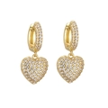 Close-up of gold heart drop earrings featuring micro-pave cubic zirconia on white background - Earrings / Gold
