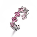 Macro detail of silver adjustable ring with clover petal motifs and pink zircon stones - Platinum / Rose Red Zirconia