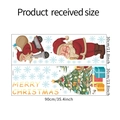 Detail van kerstmuurstickers met kerstman, boom en sneeuwvlokken, 30x90 cm groot - Standaard Stijl