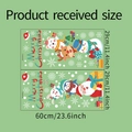 Flat lay of Christmas window decals set showing Santa and Reindeer on green background - 29x60cm / Cartoon Christmas Decoration Style