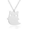 Macro detail of polished silver ghost pendant with hollowed eyes on delicate link chain - Steel