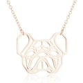 Macro detail of gold pug pendant with geometric cutout design and high-polish finish - Gold