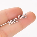 Macro view of silver 1992 year stud earring with gothic number design for women - 1992 Silver