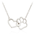 Silver heart necklace with hollow dog paw print pendant on a delicate chain link - Silver